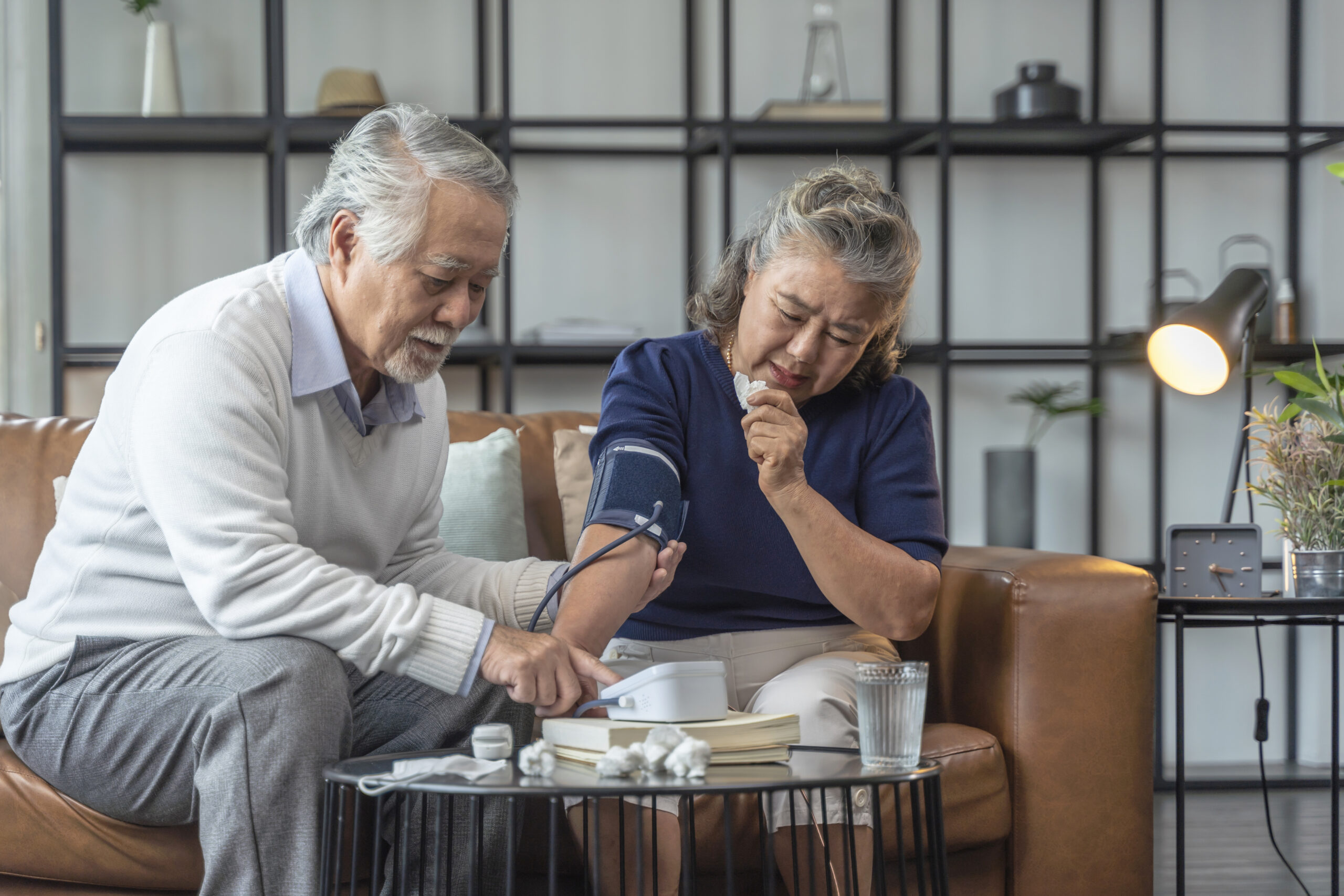 grandfather-hand-use-digital-measuring-blood-pressure-home-with-portable-device-checking-grandmotherasian-couple-checking-blood-pressure-home (1)